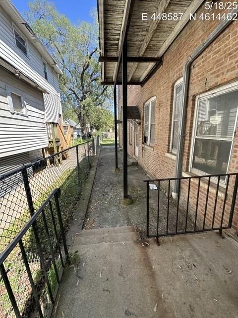 11739 S Indiana Ave, Chicago, IL 60628 - view of property exterior featuring brick siding