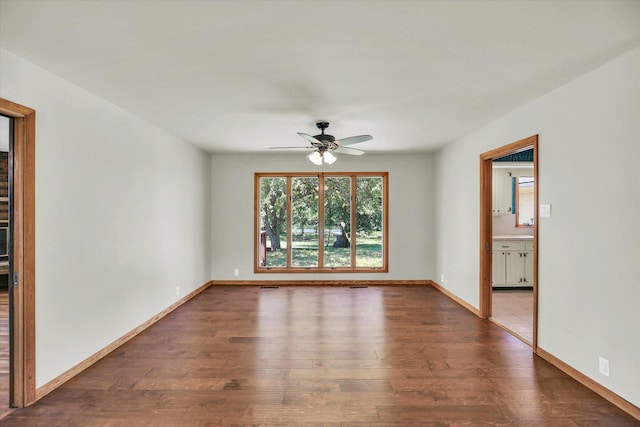 1651 Phillips Woods Ln, Urbana, IL 61802 - empty room with a ceiling fan and wood finished floors