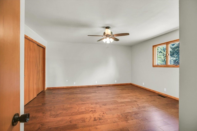 1651 Phillips Woods Ln, Urbana, IL 61802 - empty room with ceiling fan and wood finished floors