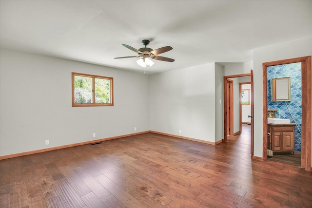 1651 Phillips Woods Ln, Urbana, IL 61802 - unfurnished room featuring a ceiling fan and wood finished floors
