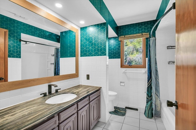 1651 Phillips Woods Ln, Urbana, IL 61802 - full bath featuring tile walls, vanity, tile patterned floors, and shower / bath combo with shower curtain