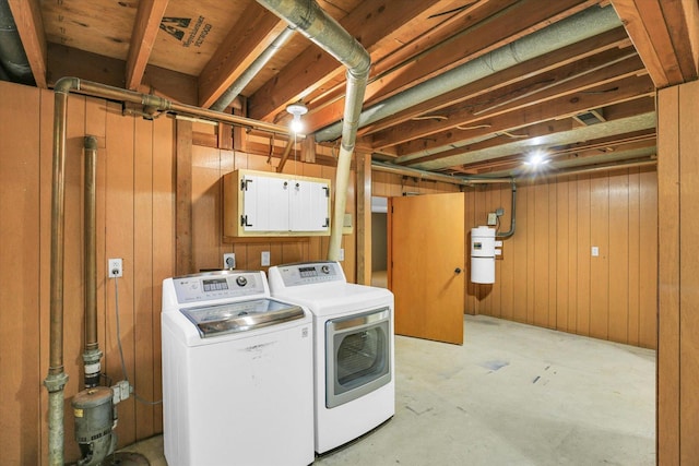1651 Phillips Woods Ln, Urbana, IL 61802 - laundry room with separate washer and dryer and wood walls