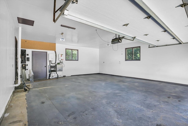 1651 Phillips Woods Ln, Urbana, IL 61802 - garage featuring a garage door opener and baseboards