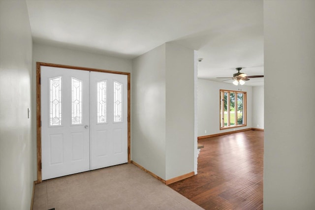 1651 Phillips Woods Ln, Urbana, IL 61802 - foyer with baseboards and a ceiling fan