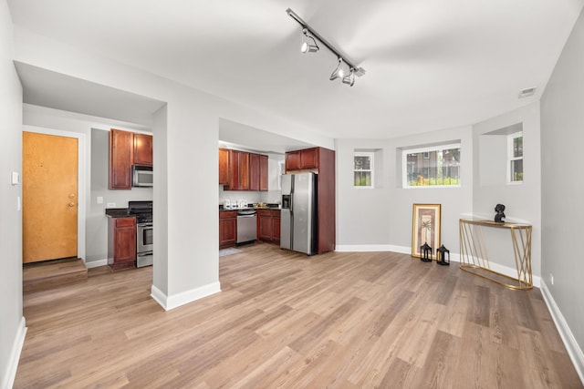2316 W Cortez St Unit G, Chicago, IL 60622 - kitchen with appliances with stainless steel finishes, light wood finished floors, and baseboards