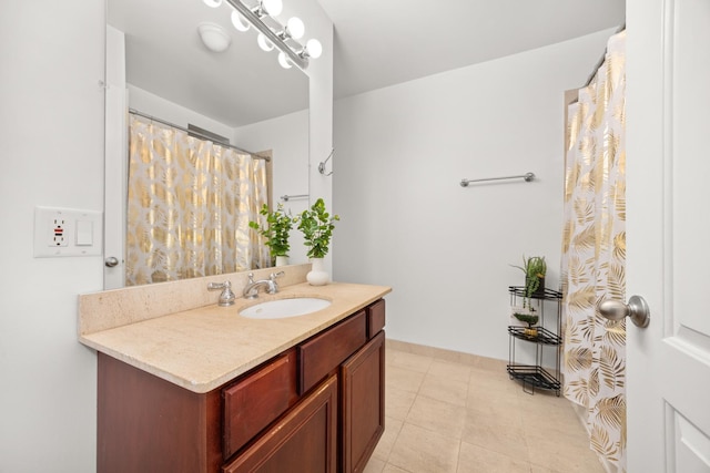 2316 W Cortez St Unit G, Chicago, IL 60622 - full bathroom featuring vanity, tile patterned floors, and baseboards