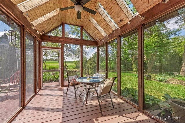 42W911 Jens Jensen Ln, Saint Charles, IL 60175 - sunroom featuring ceiling fan, a skylight, and vaulted ceiling