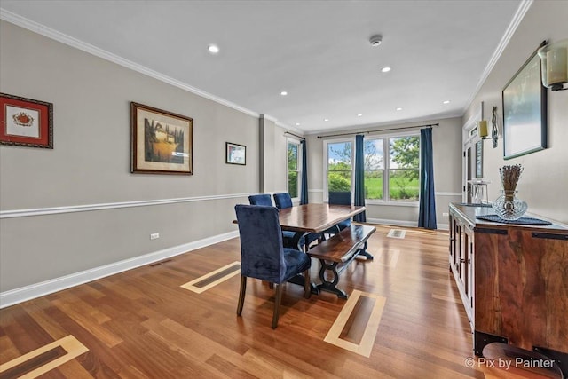 42W911 Jens Jensen Ln, Saint Charles, IL 60175 - dining space with ornamental molding, wood finished floors, recessed lighting, and baseboards