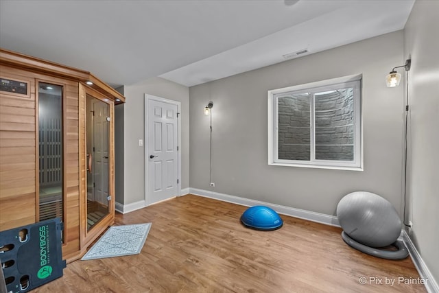 42W911 Jens Jensen Ln, Saint Charles, IL 60175 - workout area with baseboards and wood finished floors