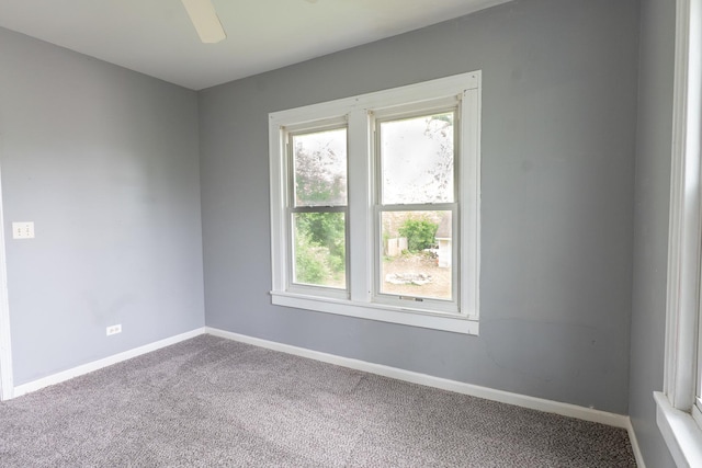 2908 Oakwood Ave, Mchenry, IL 60051 - empty room featuring carpet flooring, baseboards, and ceiling fan
