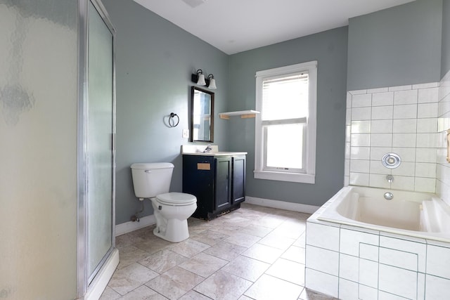 2908 Oakwood Ave, Mchenry, IL 60051 - bathroom with baseboards, vanity, a garden tub, and toilet