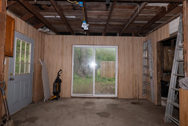 2908 Oakwood Ave, Mchenry, IL 60051 - miscellaneous room with concrete floors and wooden walls