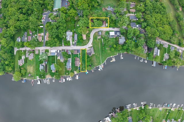 2908 Oakwood Ave, Mchenry, IL 60051 - aerial view of property and surrounding area with property boundaries highlighted, a nearby body of water, and nearby suburban area