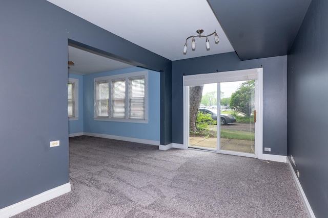 2908 Oakwood Ave, Mchenry, IL 60051 - carpeted spare room with healthy amount of natural light and baseboards