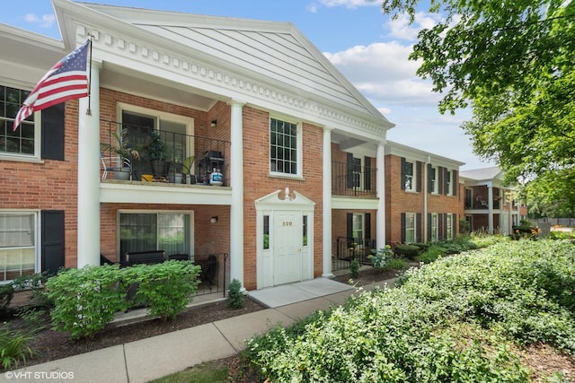 520 Shorely Dr Unit 201, Barrington, IL 60010 - greek revival inspired property with brick siding and a balcony