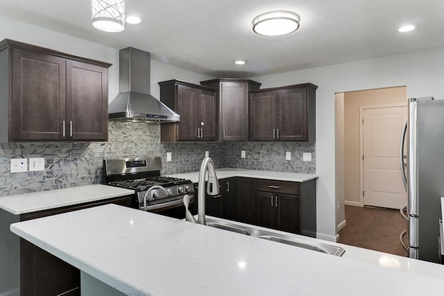 1406 Woodbine Rd Unit 1, Bloomington, IL 61704 - kitchen featuring wall chimney exhaust hood, appliances with stainless steel finishes, dark brown cabinets, light countertops, and recessed lighting