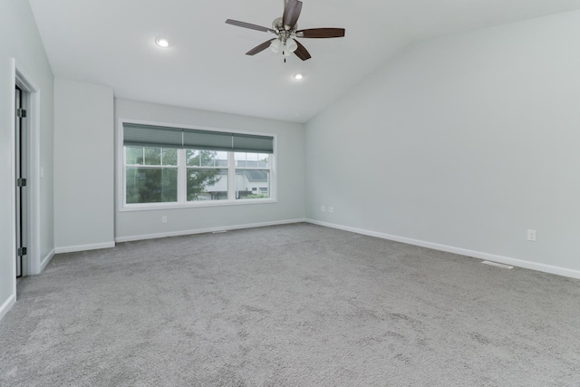 1406 Woodbine Rd Unit 1, Bloomington, IL 61704 - empty room featuring a ceiling fan, carpet, lofted ceiling, baseboards, and recessed lighting