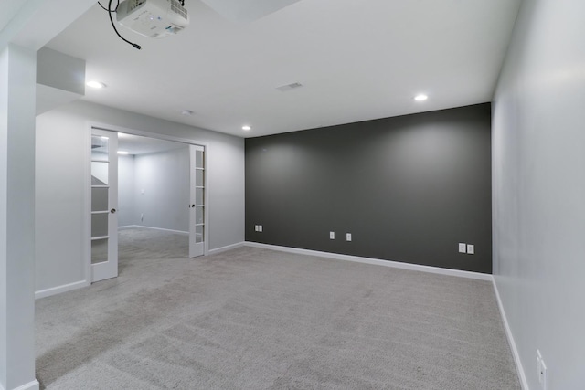 1406 Woodbine Rd Unit 1, Bloomington, IL 61704 - spare room with french doors, carpet flooring, recessed lighting, and baseboards