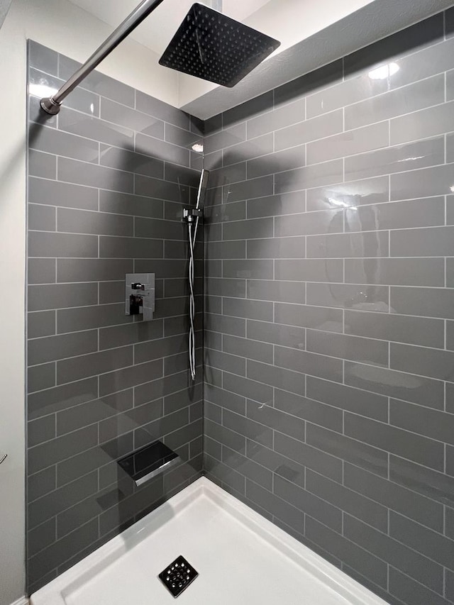1406 Woodbine Rd Unit 1, Bloomington, IL 61704 - full bath featuring a tile shower