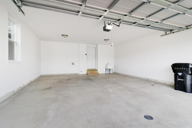 1406 Woodbine Rd Unit 1, Bloomington, IL 61704 - garage featuring a garage door opener