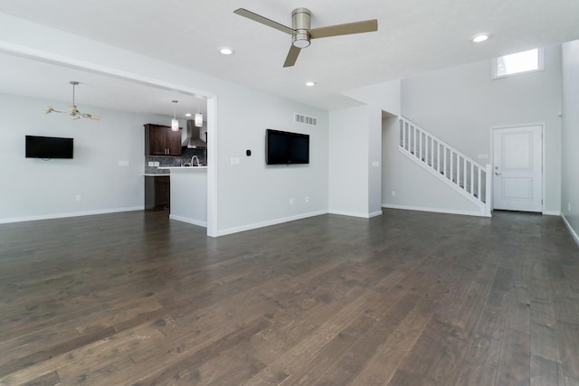 1406 Woodbine Rd Unit 1, Bloomington, IL 61704 - unfurnished living room featuring ceiling fan, dark wood-type flooring, recessed lighting, stairs, and baseboards
