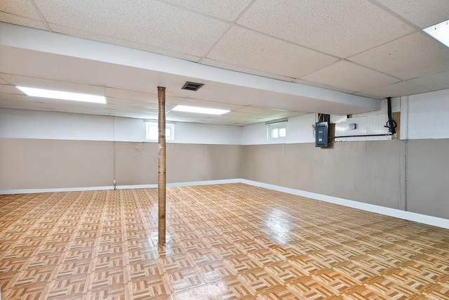 14828 Saint Louis Ave, Midlothian, IL 60445 - basement featuring a paneled ceiling and baseboards