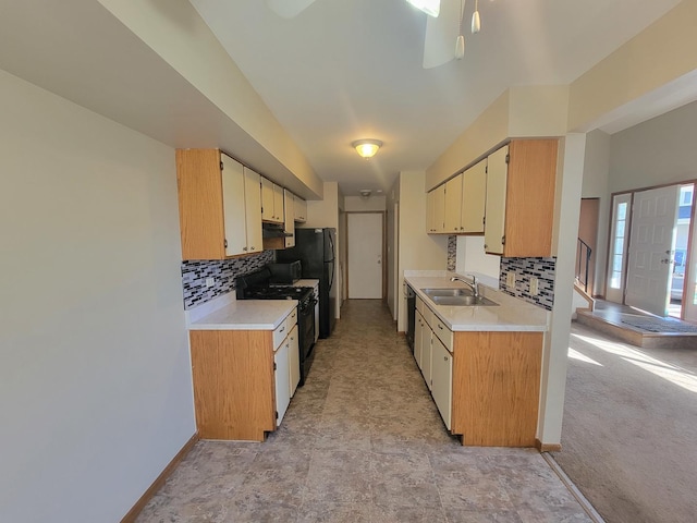 202 Teak Ln, Streamwood, IL 60107 - kitchen featuring black appliances, light countertops, and backsplash