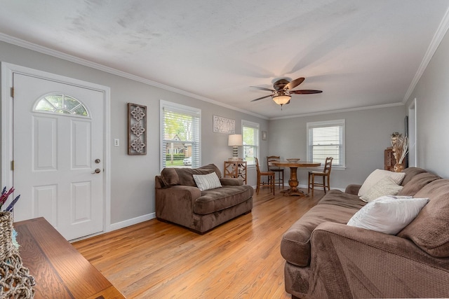 9532 Lexington Ave, Brookfield, IL 60513 - living room featuring plenty of natural light, light wood-type flooring, ornamental molding, and a ceiling fan