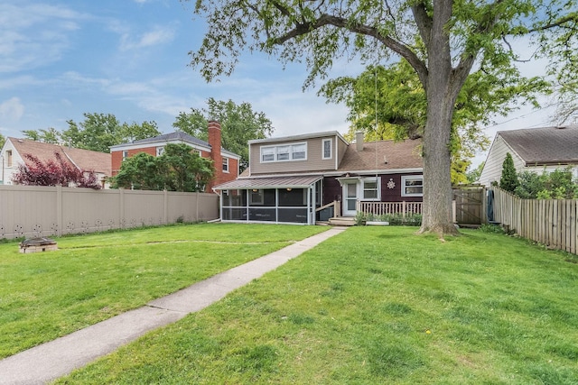9532 Lexington Ave, Brookfield, IL 60513 - back of property with a sunroom and a chimney