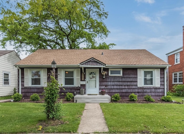 9532 Lexington Ave, Brookfield, IL 60513 - bungalow with a front yard and roof with shingles
