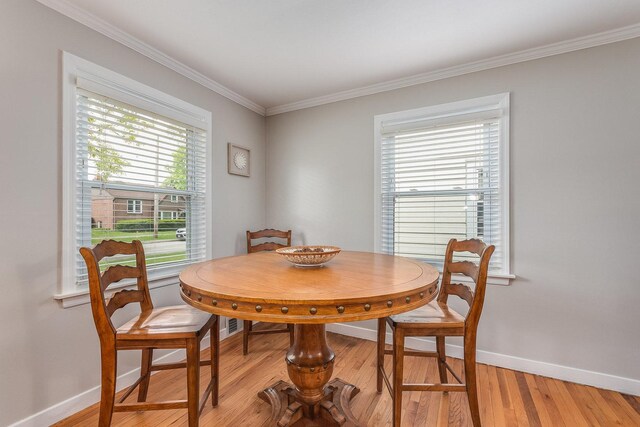 9532 Lexington Ave, Brookfield, IL 60513 - dining space with crown molding, baseboards, and light wood-type flooring