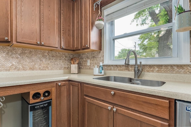 9532 Lexington Ave, Brookfield, IL 60513 - kitchen with a sink, brown cabinetry, decorative backsplash, light countertops, and dishwasher