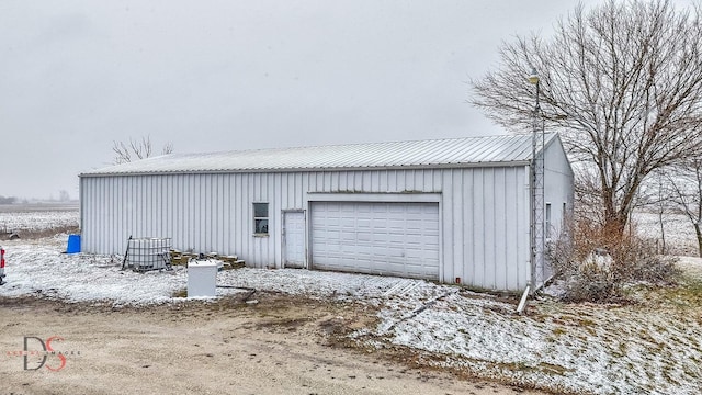 22386 N 3400 E Rd, Emington, IL 60934 - snow covered garage featuring a garage