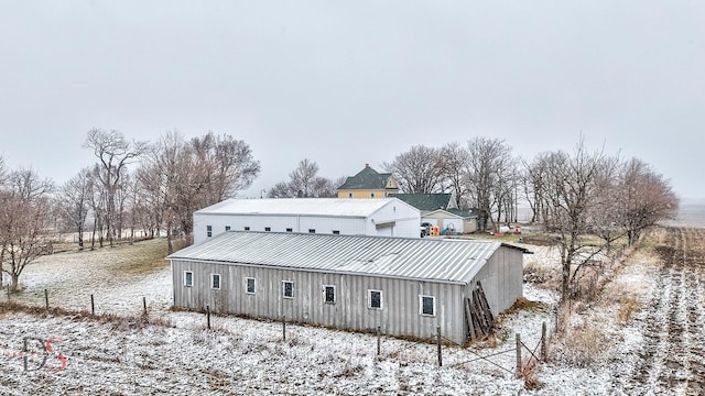 22386 N 3400 E Rd, Emington, IL 60934 - snow covered back of property with metal roof