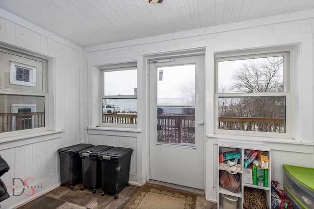 22386 N 3400 E Rd, Emington, IL 60934 - doorway to outside with healthy amount of natural light, wood walls, and wood finished floors