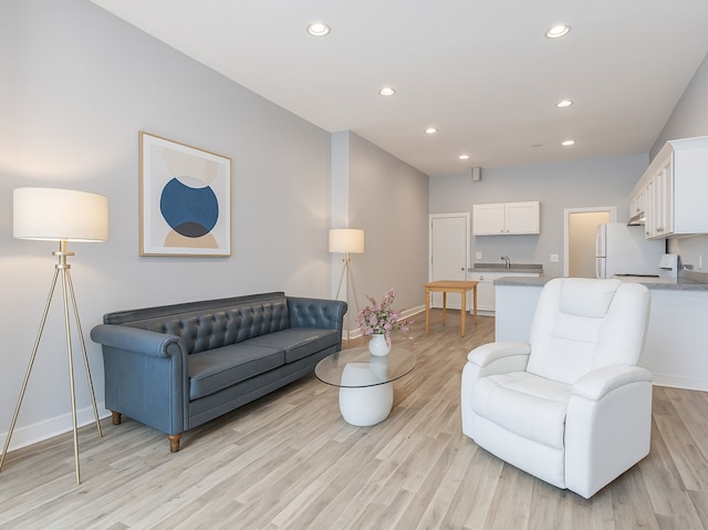 2823 W Flournoy St, Chicago, IL 60612 - living area with light wood finished floors, recessed lighting, and baseboards