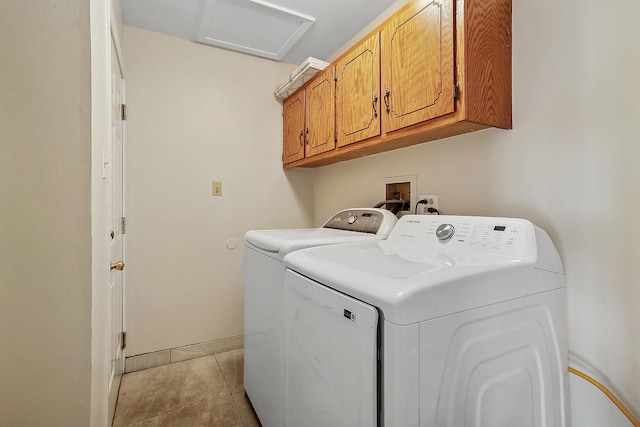 11114 Heritage Dr Unit 3C, Palos Hills, IL 60465 - laundry area with cabinet space, washer and clothes dryer, light tile patterned flooring, and attic access