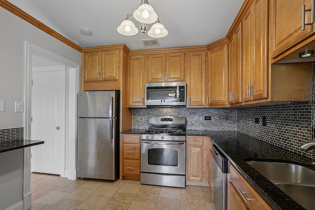11114 Heritage Dr Unit 3C, Palos Hills, IL 60465 - kitchen with appliances with stainless steel finishes, a sink, decorative backsplash, and dark stone counters