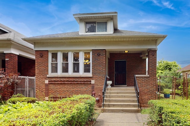 7832 S Paxton Ave, Chicago, IL 60649 - view of front of home featuring brick siding