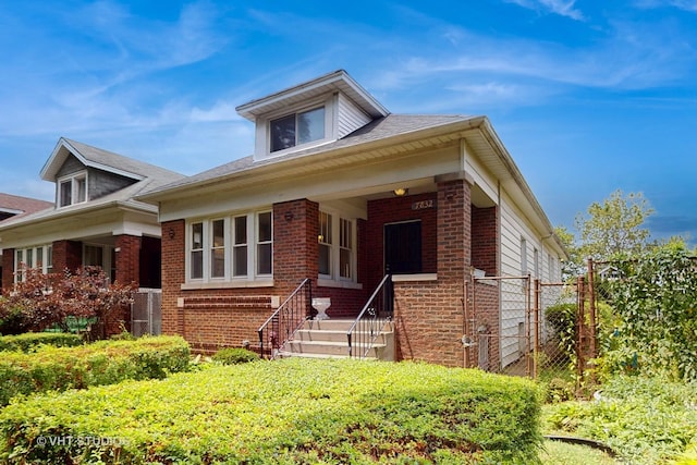 7832 S Paxton Ave, Chicago, IL 60649 - bungalow-style house with brick siding