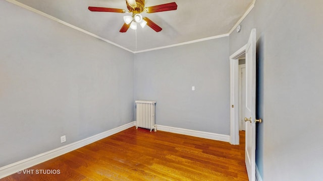 7832 S Paxton Ave, Chicago, IL 60649 - unfurnished room with radiator, wood finished floors, ceiling fan, and crown molding
