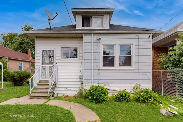 7832 S Paxton Ave, Chicago, IL 60649 - bungalow-style home featuring roof with shingles