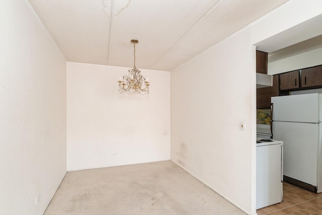 1301 N Western Ave Unit 236, Lake Forest, IL 60045 - unfurnished dining area featuring a chandelier and light carpet
