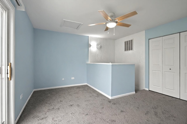 126 Cora Ave Unit D, Fox Lake, IL 60020 - unfurnished bedroom with attic access, carpet flooring, a closet, baseboards, and ceiling fan