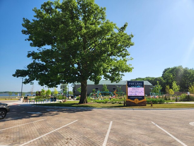 126 Cora Ave Unit D, Fox Lake, IL 60020 - view of uncovered parking lot