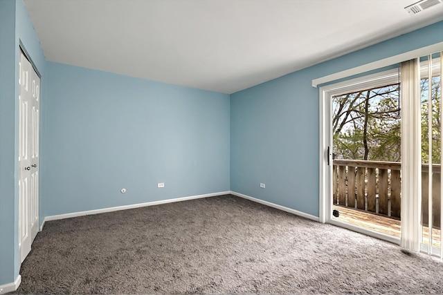 126 Cora Ave Unit D, Fox Lake, IL 60020 - unfurnished bedroom with carpet floors, baseboards, access to outside, and a closet