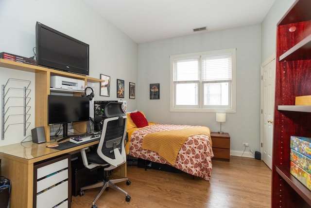 4541 N Malden St Unit 3N, Chicago, IL 60640 - bedroom featuring wood finished floors, an office area, and baseboards