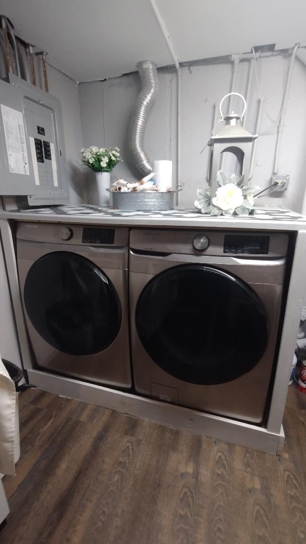 432 Rose St, Bensenville, IL 60106 - washroom featuring electric panel, washing machine and dryer, and wood finished floors