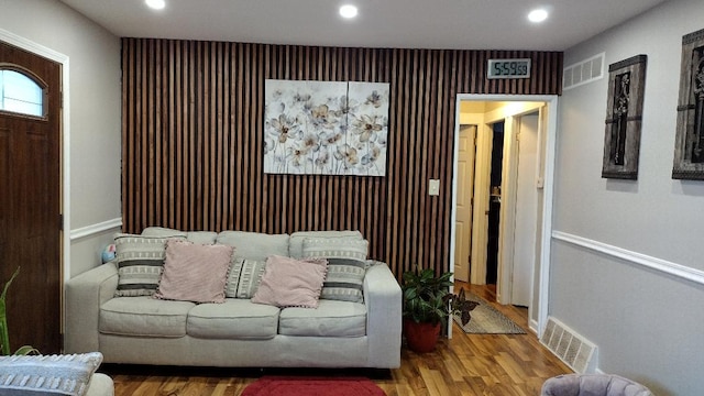 432 Rose St, Bensenville, IL 60106 - living room featuring wood finished floors, recessed lighting, and an accent wall