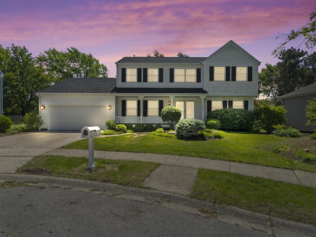 1520 Fordham Ct, Naperville, IL 60565 - traditional-style home featuring covered porch, an attached garage, driveway, and a lawn